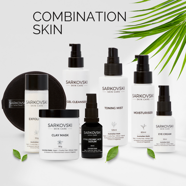 SARKOVSKI® Combination Skin Collection featuring Exfoliant, Clay Mask, Gel Cleanser, Toning Mist, Hyaluronic Acid Serum, Moisturiser, and Eye Cream displayed with fresh green leaves.