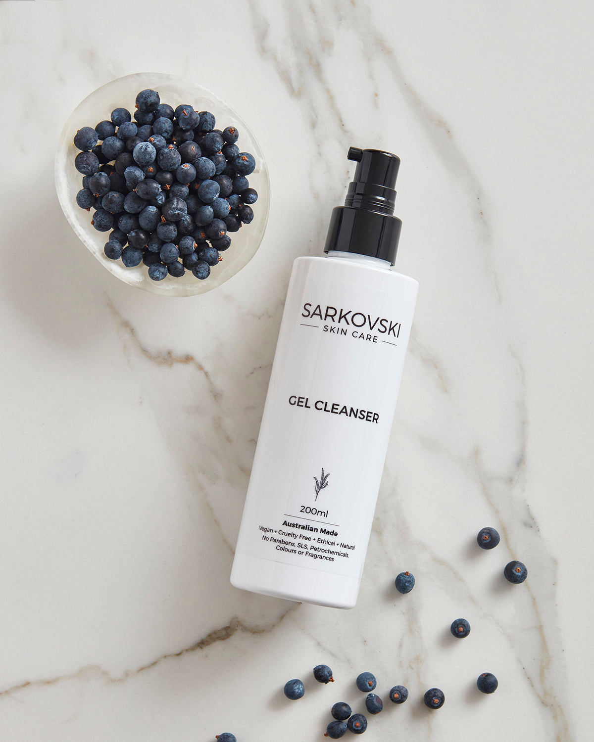 A Flat-Lay photo of SARKOVSKI® Gel Cleanser - Australian-made with antibacterial juniper berry and lime essential oils designed for oily and acne-prone skin.